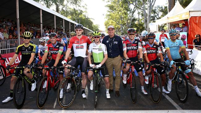 Race director Mike Turtur with seven of the past ochre jersey winners – Cameron Meyer, Simon Gerrans, Andre Greipel, Tom Jelte-Slagter, Rohan Dennis, Richie Porte and Luis Leon Sanchez on the start line. Picture Sarah Reed