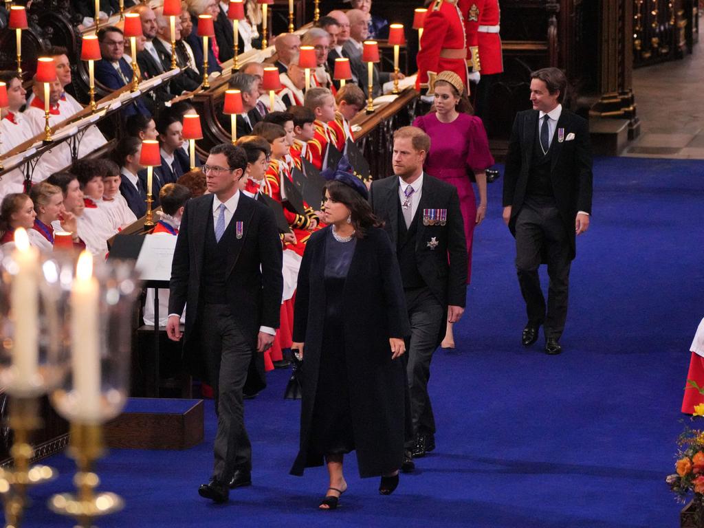 Prince Harry, followed by Edoardo Mapelli Mozzi, walks behind Princess Eugenie and Jack Brooksbank. Picture: AFP