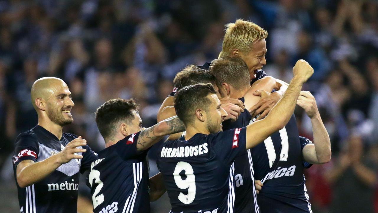 Melbourne Victory celebrate a goal