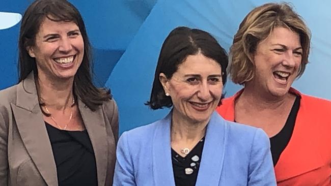 Premier Gladys Berejiklian, with East Hills Liberal candidate Wendy Lindsay, left, and Roads Minister Melinda Pavey, at Padstow Park Friday to announced the smart traffic lights program. Picture: Lawrence Machado