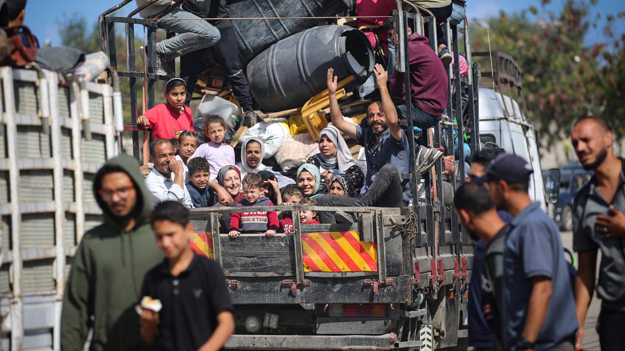 Displaced Palestinians flee Rafah with their belongings to safer areas in the southern Gaza Strip on May 7, 2024. Picture: AFP