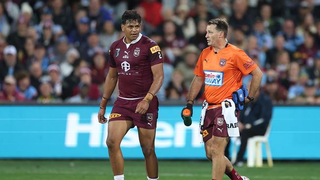 ADELAIDE, AUSTRALIA – MAY 31: Selwyn Cobbo of the Maroons speaks to a trainer during game one of the 2023 State of Origin series between the Queensland Maroons and New South Wales Blues at Adelaide Oval on May 31, 2023 in Adelaide, Australia. (Photo by Mark Kolbe/Getty Images)