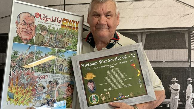 The 'chook incident' was captured in a cartoon portrait by Daily Mercury cartoonist Harry Bruce. Ray Higgins' service record was also framed by military historian Graham Jackson. Picture: Duncan Evans