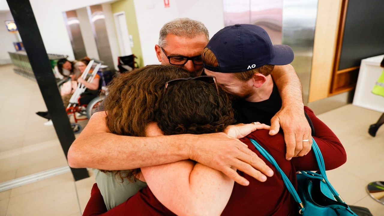 Loved ones reunited as state borders lifted across Australia