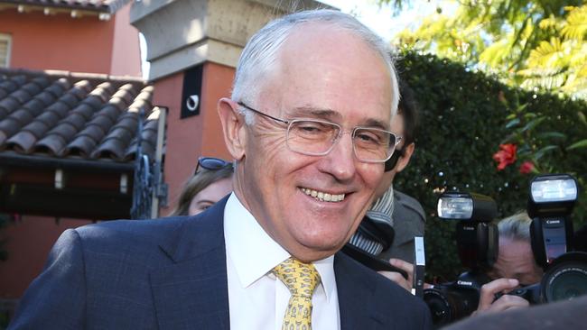 Malcolm Turnbull is all smiles as he leaves his home. Picture: AAP