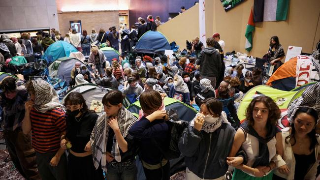 Pro-Palestinian students hold a sit-in at Melbourne University's Arts West building. Photo: AFP