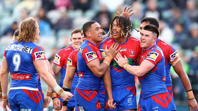 CANBERRA, AUSTRALIA - JULY 29: Dominic Young of the Knights celebrates a try with team mates that was later disallowed during the round 22 NRL match between Canberra Raiders and Newcastle Knights at GIO Stadium on July 29, 2023 in Canberra, Australia. (Photo by Mark Nolan/Getty Images)