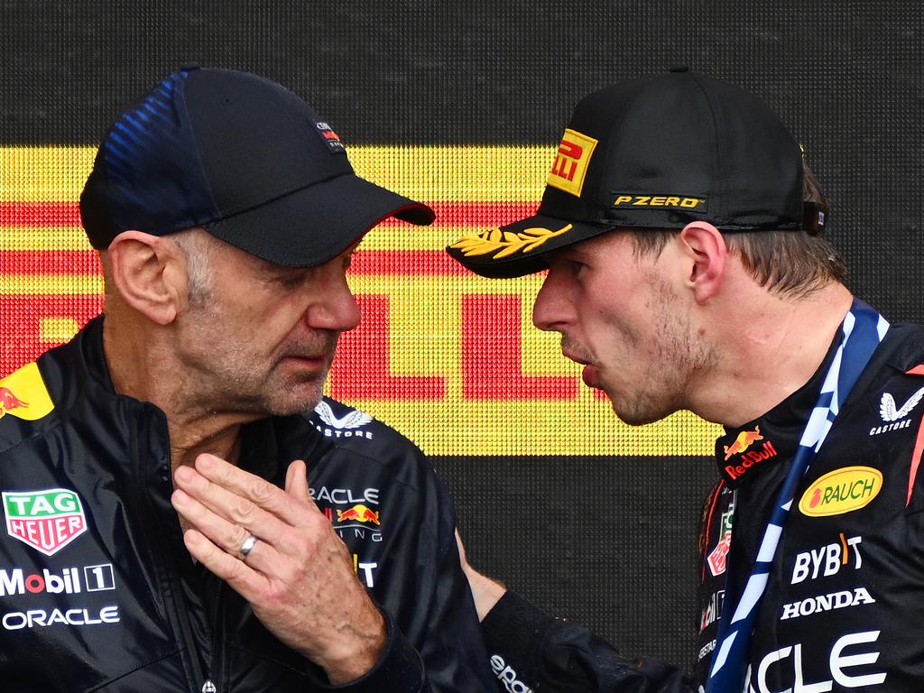 MONTREAL, QUEBEC - JUNE 18: Adrian Newey, the Chief Technical Officer of Red Bull Racing and First placed Max Verstappen of the Netherlands and Oracle Red Bull Racing celebrate on the podium during the F1 Grand Prix of Canada at Circuit Gilles Villeneuve on June 18, 2023 in Montreal, Quebec. (Photo by Clive Mason/Getty Images)
