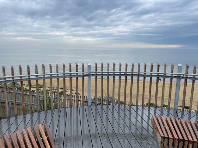 Calm after the rain at the new Life Saving Club at Mentone Beach. Picture: Janet Mann, Mentone.