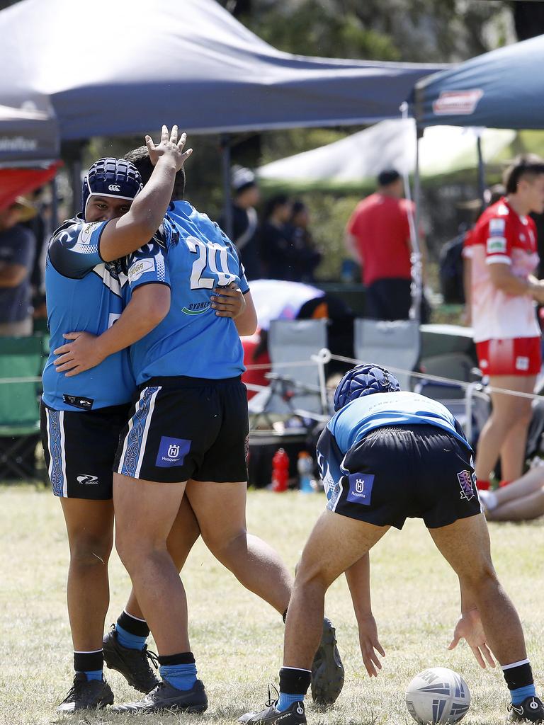 Teammates congratulate Tye Hau from Maori ma on a try. Under 16 Boys Maori Ma v Tonga. Harmony Nines Rugby League. Picture: John Appleyard