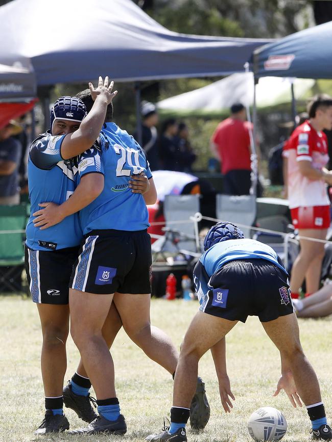 Teammates congratulate Tye Hau from Maori ma on a try. Under 16 Boys Maori Ma v Tonga. Harmony Nines Rugby League. Picture: John Appleyard