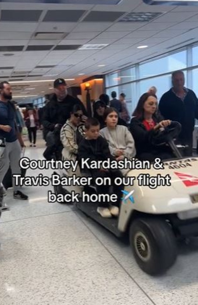 Kourtney Kardashian and Travis Barker arrive in Sydney Airport with their kids.