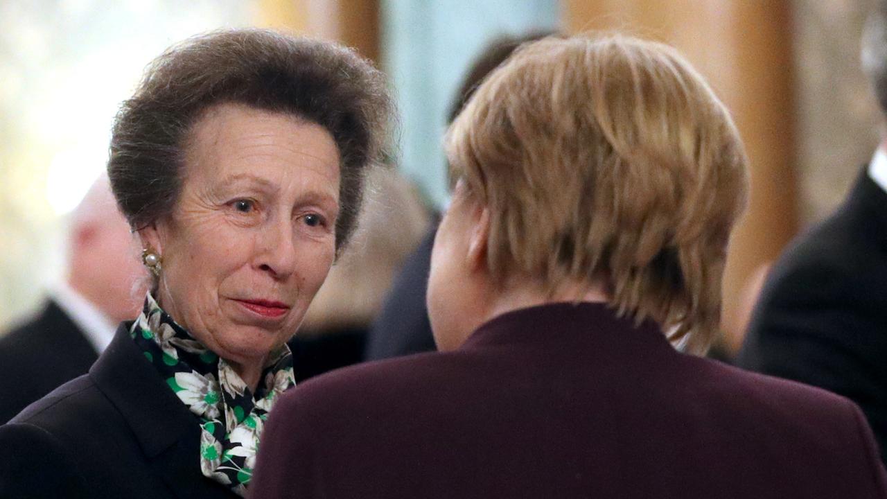 Princess Anne talks to Angela Merkel. Picture: Yui Mok/Getty Images