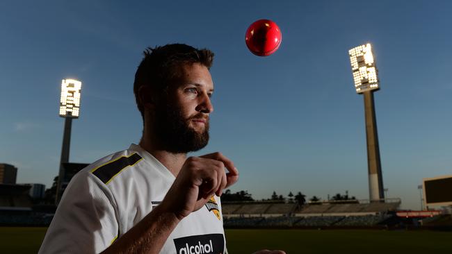 SPORT - Western Australia vs New Zealand, day/night tour match, using the pink ball. Photo by Daniel Wilkins. PICTURED- Western Australia's bowler Andrew Tye with the pink ball