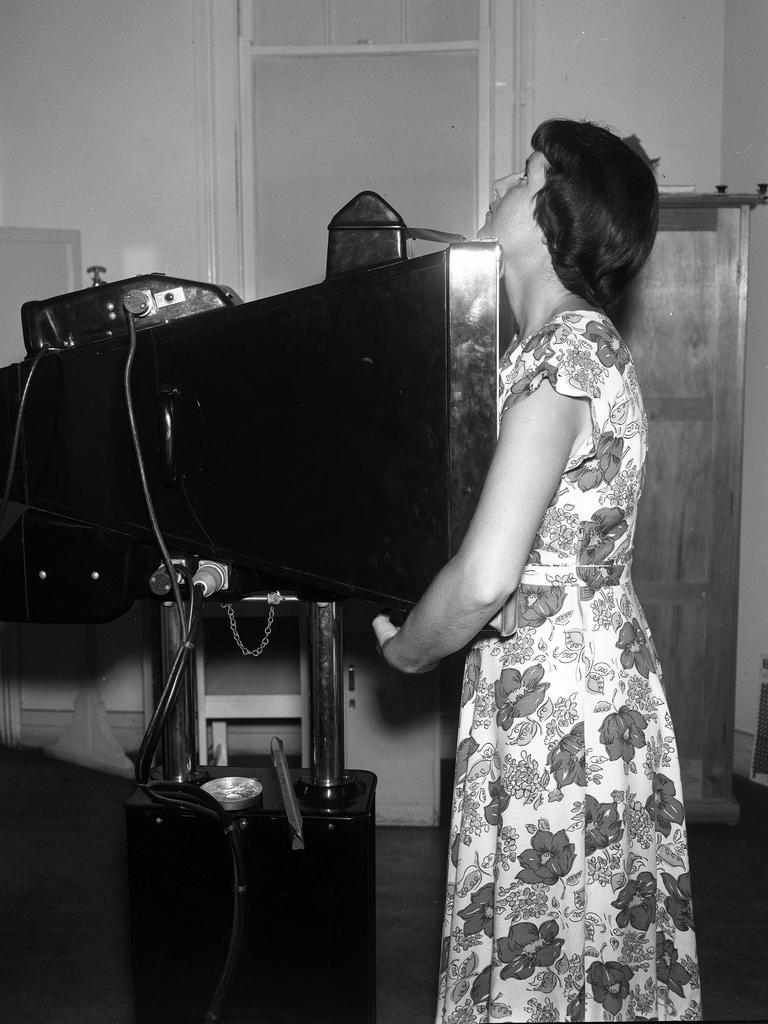 X-ray at the Chest Clinic in George St, Brisbane CBD, in 1955. Almost 35,000 had chest scans to detect tuberculosis at the clinic that year. Picture: Cliff Postle