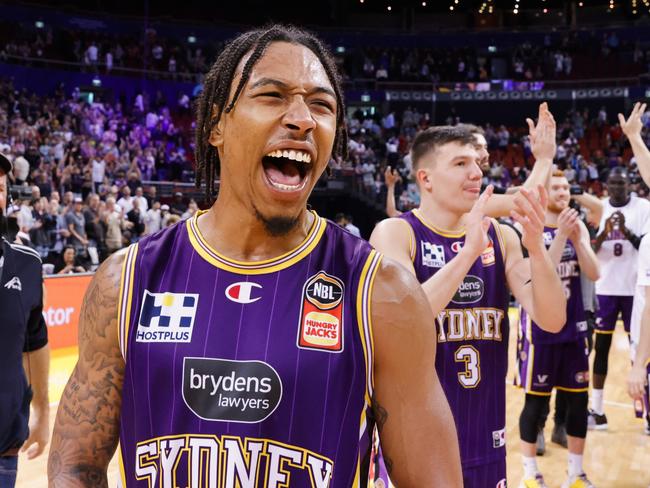 SYDNEY, AUSTRALIA - MAY 01: Jaylen Adams of the Kings celebrates with team mates after their win game two of the NBL Semi Final series between Sydney Kings and Illawarra Hawks at Qudos Bank Arena on May 01, 2022 in Sydney, Australia. (Photo by Jenny Evans/Getty Images)