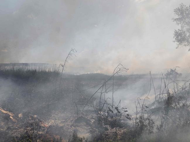 Smoke fills the skies from burning fields after a bombardment in Bakhmut, Eastern Ukraine. Picture: AFP