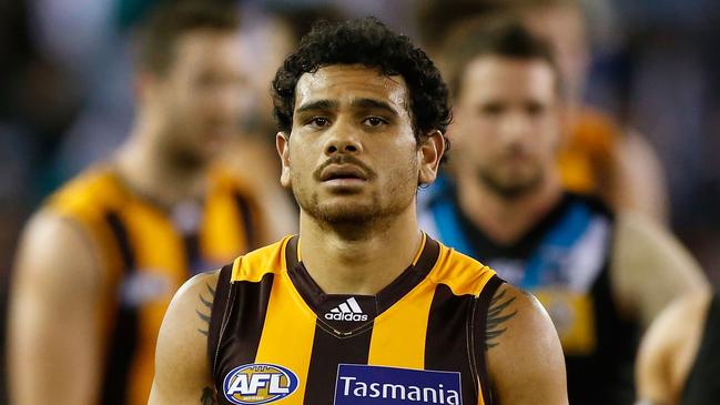 MELBOURNE, AUSTRALIA - AUGUST 21: Cyril Rioli of the Hawks looks dejected after a loss during the 2015 AFL round 21 match between the Hawthorn Hawks and Port Adelaide Power at Etihad Stadium, Melbourne, Australia on August 21, 2015. (Photo by Adam Trafford/AFL Media/Getty Images)