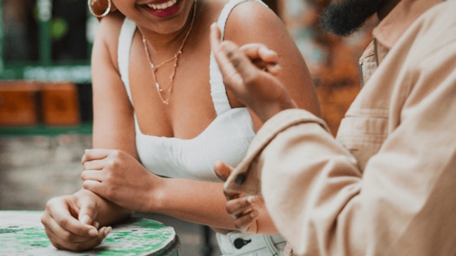 If you're someone who tends to be more demure in everyday life, try embracing your carefree and playful brat persona when dating.  Image: Pexels