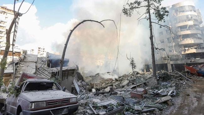 Smoke billows from the site of an overnight Israeli air strike in Beirut's southern suburb of Hadat on October 2. Picture: Ibrahim Amro/AFP