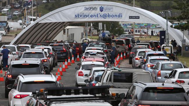 People queue at the St Vincent’s Bondi Beach Covid-19 drive through testing clinic last Friday. Picture: Getty Images