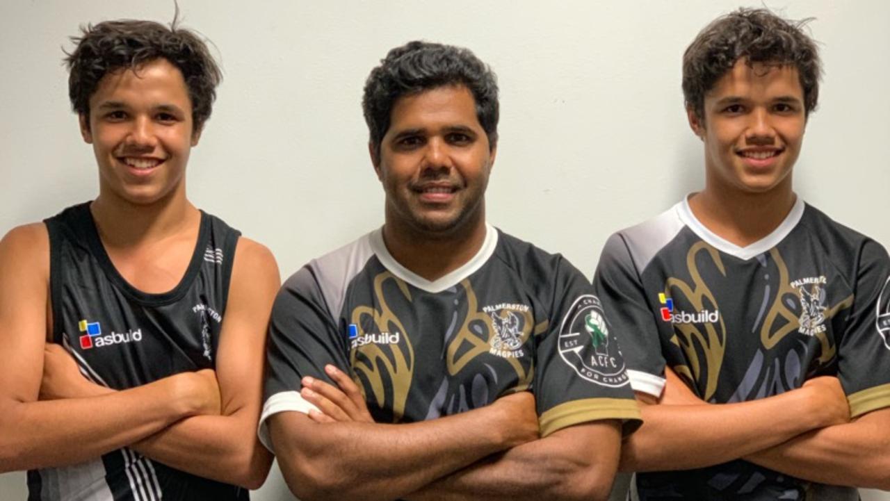 The Davey twins, Alwyn jnr (left) and Jayden, flank their dad, former Essendon player Alwyn Davey snr. Picture: Supplied