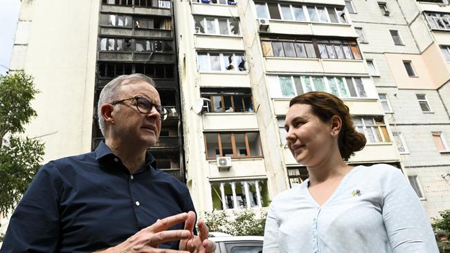 Albanese speaks to Australian Embassy staffer Nadiia Teriokhina near her destroyed house in Irpin. Picture: AAP