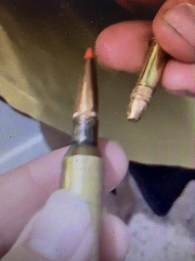 A video of a boy handling ­ammunition was shared on the chat.