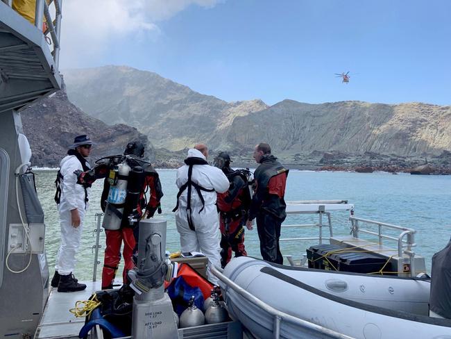 Police divers preparing to search the waters near White Island. Picture: New Zealand police via AP