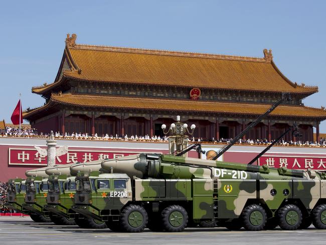 Chinese military vehicles carrying DF-21D anti-ship ballistic missiles travel past Tiananmen Gate during a military parade to commemorate the 70th anniversary of the end of World War II in Beijing Thursday Sept. 3, 2015. REUTERS/Andy Wong/Pool      TPX IMAGES OF THE DAY