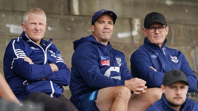 Cats head coach Chris Scott (centre) with recruiter Stephen Wells and football manager Simon Lloyd during the pre-season competition. Picture: AAP Image/Michael Dodge