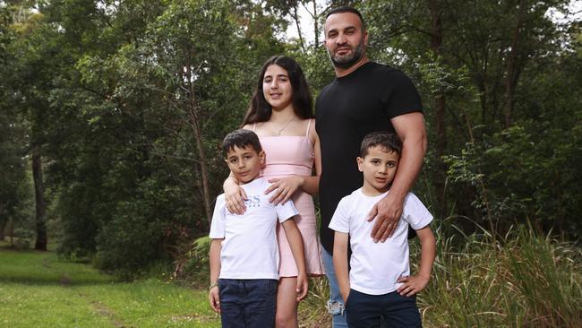 Danny Abdallah, with his children, Alex, 7, Liana, 12, and Michael, 5. Three other children died when they were hit by a car in Oatlands in February 2020. Picture: Justin Lloyd