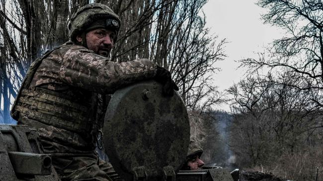 Ukrainian servicemen move towards the front line near Bakhmut. Picture: AFP.