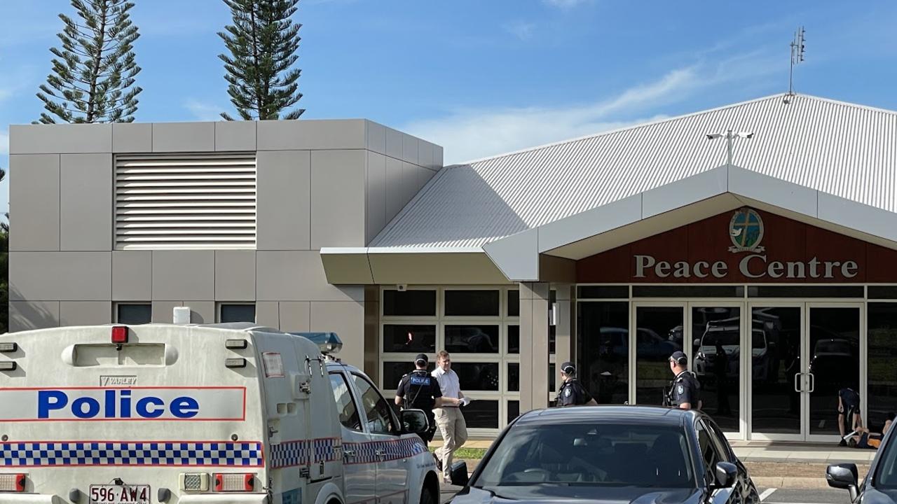 Police cars outside Peace Lutheran College in Cairns after a female student, 18, was allegedly stabbed by a male student. Picture: Isaac McCarthy