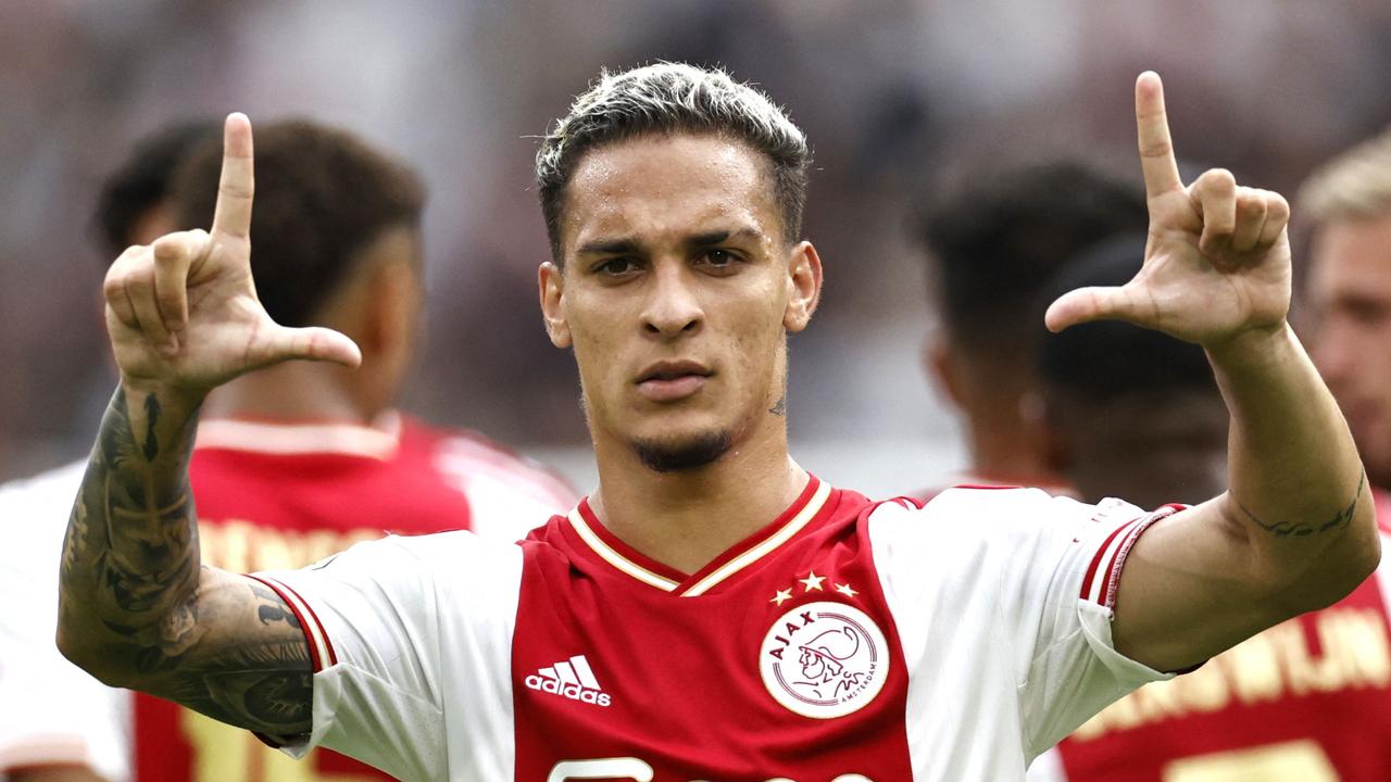 Ajax's Brazilian midfielder Antony Matheus Dos Santos celebrates after socring the 2-1 goal during the Dutch Eredivisie match between Ajax Amsterdam and FC Groningen at the Johan Cruijff ArenA in Amsterdam, on August 14, 2022. (Photo by MAURICE VAN STEEN / ANP / AFP) / Netherlands OUT