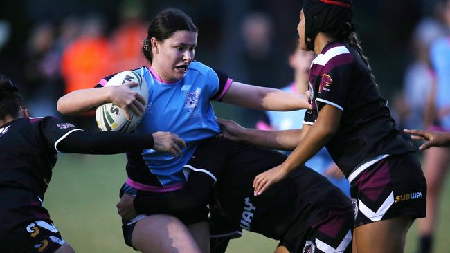 Titans Schools League at Burleigh Bears Junior Rugby League. Year 11/12 Division 1 girls Marymount v Marsden. Marymounts Zoe Riddell charges into the defence. Picture Glenn Hampson