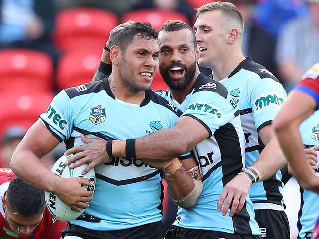 NEWCASTLE, AUSTRALIA - MAY 27:  Jesse Ramien of the Sharks celebrates a try with team mates  during the round 12 NRL match between the Newcastle Knights and the Cronulla Sharks at McDonald Jones Stadium on May 27, 2018 in Newcastle, Australia.  (Photo by Tony Feder/Getty Images)