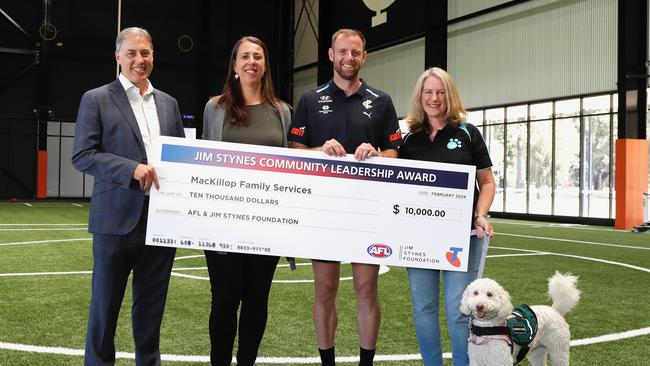 Sam Patterson, Anna Masci, Sam, Susie Podesta and Pebbles the therapy dog from MacKillop Family Services. Picture: Sarah Morton