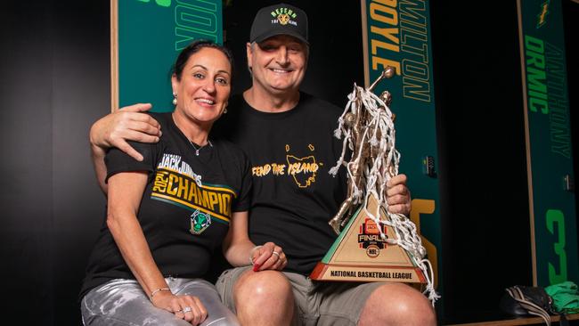 Tasmania JackJumpers CEO Christine Finnegan and coach Scott Roth with the NBL trophy. Picture: Linda Higginson / Tasmania JackJumpers