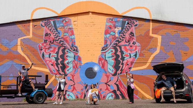 Brad Stankiewicz, Emma McGee, Ruby Baritt, Oonagh Dalton and David Collins as the mural by Lucy Lucy will be lit up as part of the new DOUBLE EXPOSURE event for DSAF 2025. Picture: Pema Tamang Pakhrin