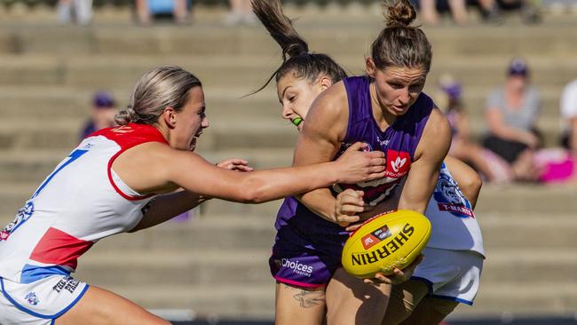 Kiara Bowers takes on two Bulldogs. Picture: AAP