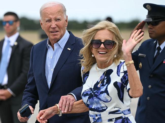 US President Joe Biden and First Lady Jill Biden step off Air Force One upon arrival at Francis S. Gabreski Airport in Westhampton Beach, New York on June 29, 2024. Biden is heading to East Hampton, New York, to attend campaign fundraisers. (Photo by Mandel NGAN / AFP)