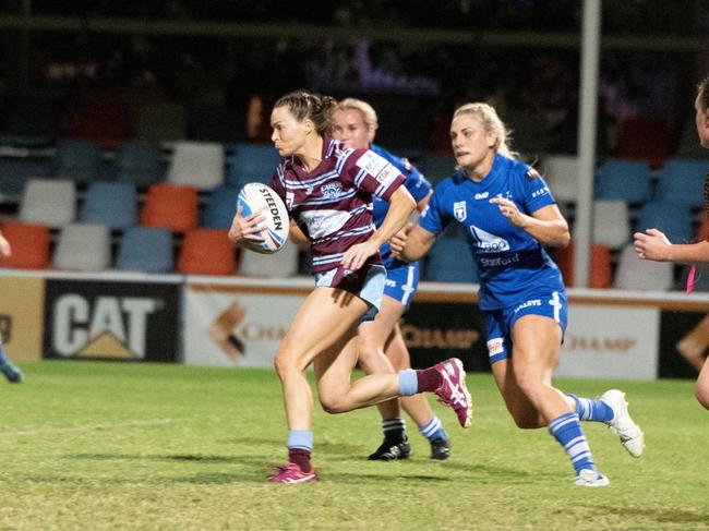 CQ Capras centre Jess Powell in full flight against Valleys Diehards on Saturday night. Photo: Brendan Kirkman
