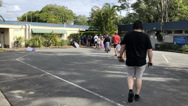 Voters settle in for a wait with big lines at Ashmore State School.