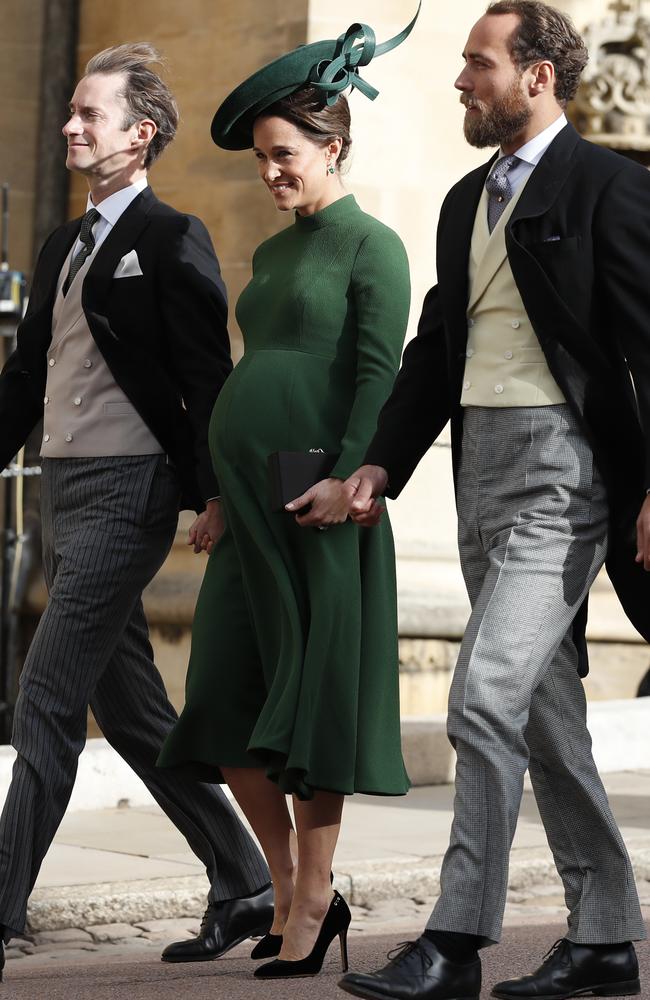 Pippa Middleton, centre, with her brother James Middleton, right, and husband James Matthews, far left, at Princess Eugenie’s wedding in 2018. Picture: Getty Images