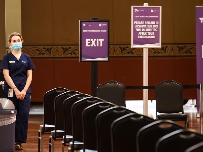 MELBOURNE, AUSTRALIA- NewsWire Photos 1 May 2021 : A nurse waits for people to sit and wait for 15 minutes after receiving their AstraZeneca vaccine at the Royal Exhibition Building in Carlton. Picture : NCA NewsWire / Ian Currie