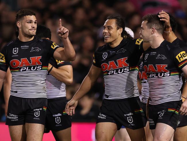 PENRITH, AUSTRALIA - SEPTEMBER 09:  Dylan Edwards of the Panthers celebrates with Jarome Luai of the Panthers and Nathan Cleary of the Panthers after scoring a try during the NRL Qualifying Final match between the Penrith Panthers and the Parramatta Eels at BlueBet Stadium on September 09, 2022 in Penrith, Australia. (Photo by Mark Kolbe/Getty Images)