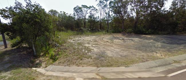 Luke Woods rolled backwards into this ditch at the corner of the Pacific Highway and Chain Valley Bay Rd while using the dating app Tinder. Picture: Google