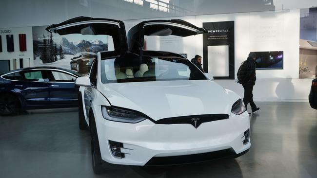 A Tesla vehicle on display in a Manhattan dealership.