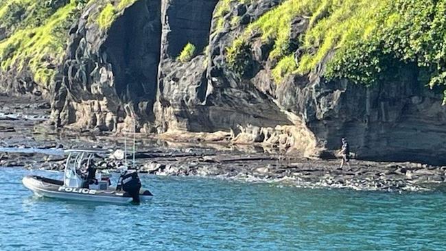 Queensland Police Service officers at Cowley Beach and SES volunteers on quad bikes from Liverpool Creek to northern most point of Cowley Beach in the search for three missing fishermen. Picture: Queensland Police